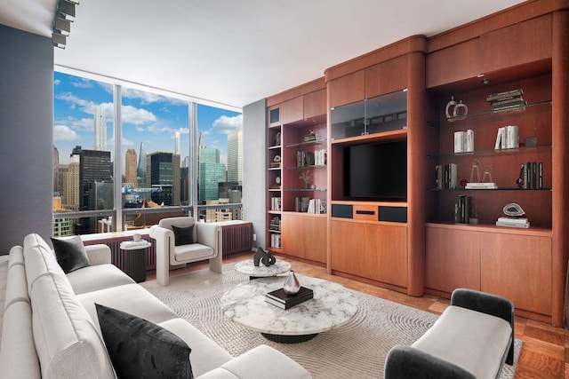 living room featuring floor to ceiling windows, radiator heating unit, and built in features