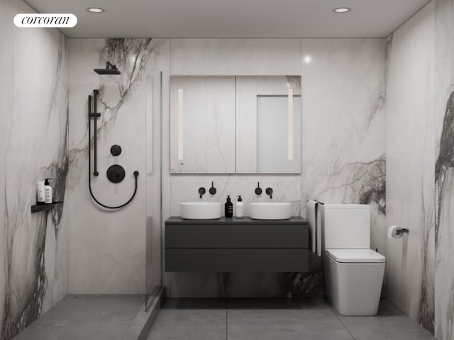 bathroom with toilet, walk in shower, and vanity