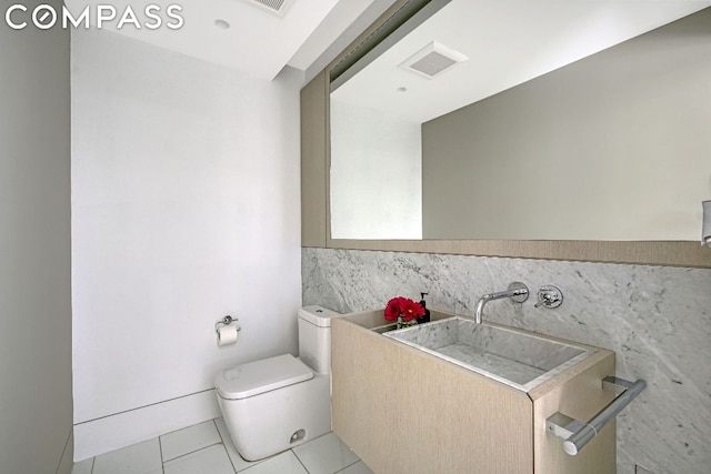 53 Leonard St Ph, Ph, New York City, NY 10013 - half bathroom with tile walls and tile patterned floors