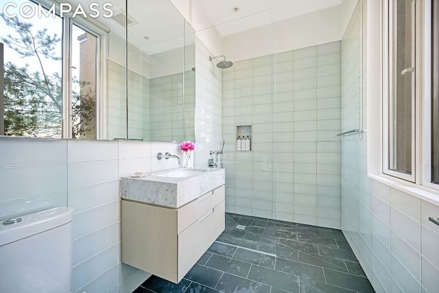 53 Leonard St Ph, Ph, New York City, NY 10013 - full bath featuring tile walls, tiled shower, and vanity