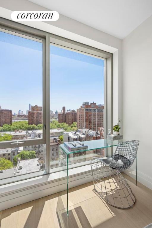 interior space featuring a healthy amount of sunlight and light hardwood / wood-style floors