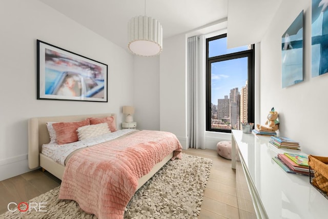 bedroom featuring multiple windows