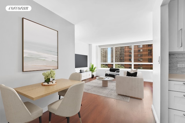 200 E 94th St Unit 603, New York City, NY 10128 - dining area featuring wood finished floors