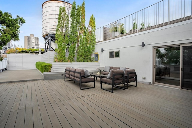 wooden deck with an outdoor hangout area