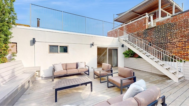 wooden deck with outdoor lounge area