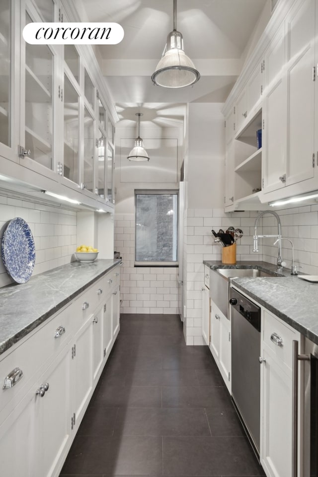 kitchen with open shelves, stainless steel dishwasher, glass insert cabinets, and white cabinets