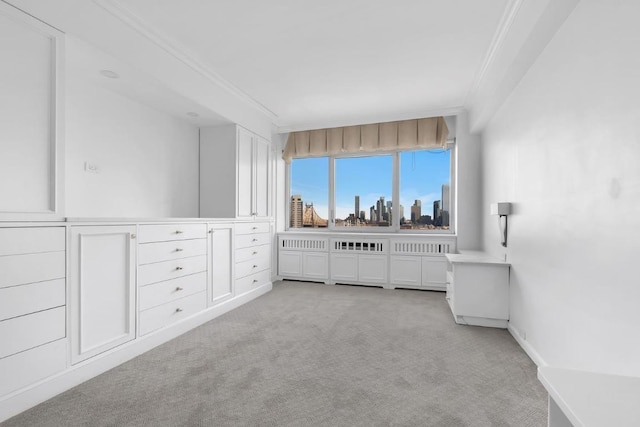 carpeted bedroom with crown molding