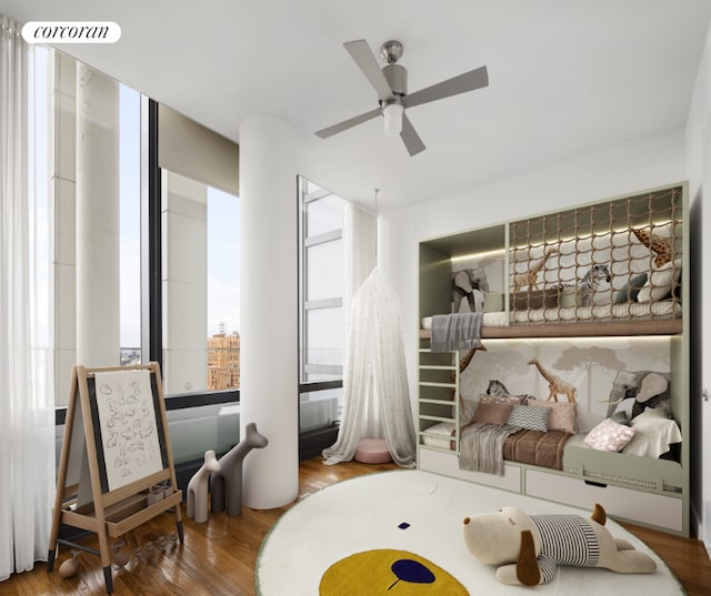 living area featuring ceiling fan and wood-type flooring