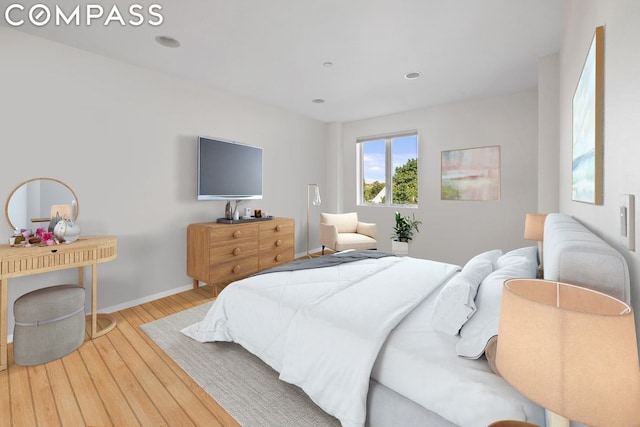 bedroom featuring hardwood / wood-style flooring