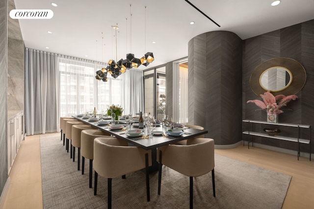 430 E 58th St Unit 19B, New York City, NY 10022 - dining room featuring recessed lighting and a chandelier