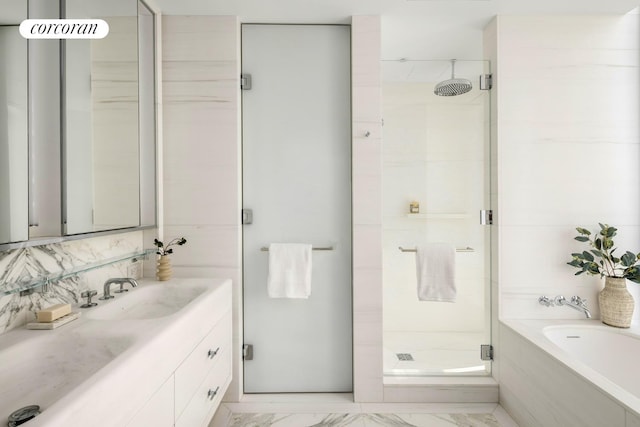 430 E 58th St Unit 19B, New York City, NY 10022 - full bathroom featuring a stall shower, a garden tub, marble look tile flooring, vanity, and decorative backsplash