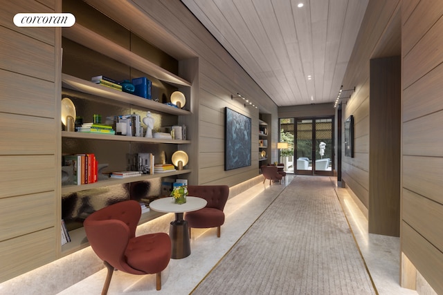 430 E 58th St Unit 19B, New York City, NY 10022 - community lobby with wooden walls and recessed lighting