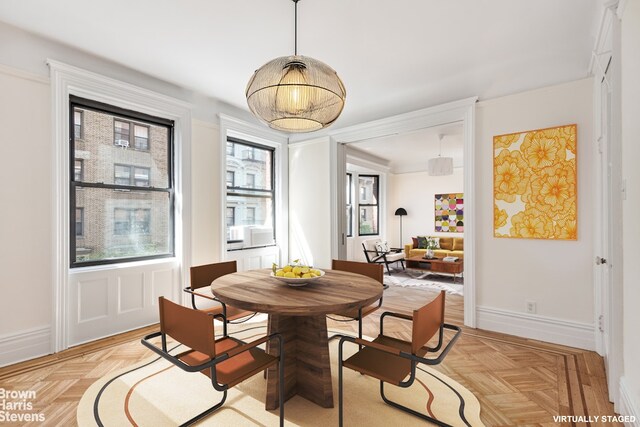 dining area with light parquet flooring