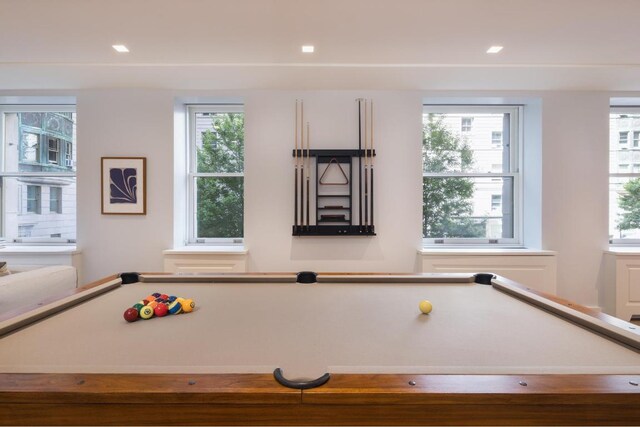 game room featuring a wealth of natural light and billiards