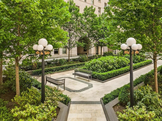 surrounding community featuring a patio area