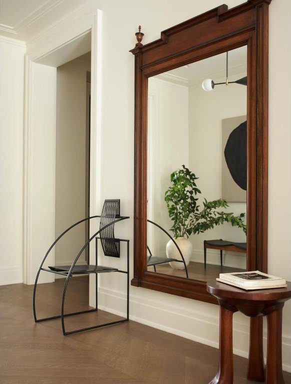 interior space featuring crown molding and hardwood / wood-style flooring