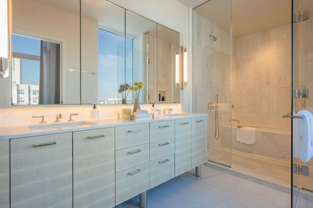 bathroom with vanity and a shower with shower door