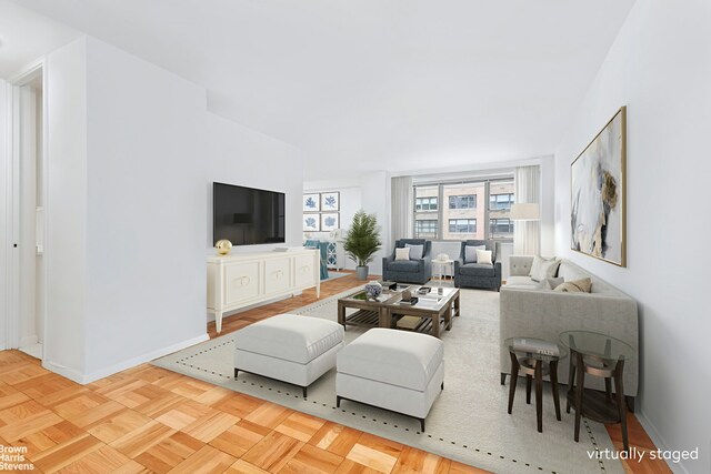 living room with light parquet floors