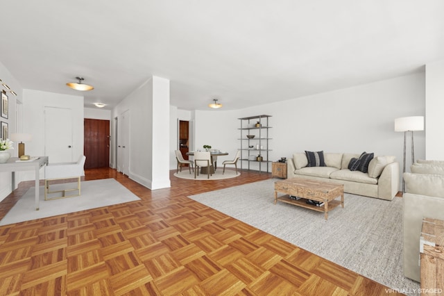 living room featuring light parquet floors