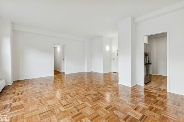 empty room with baseboards