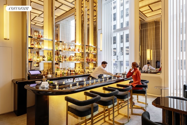 100 E 53rd St Unit 8C, New York City, NY 10022 - community bar area with plenty of natural light