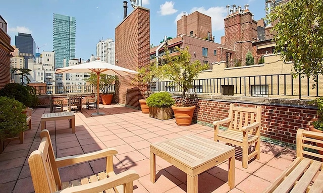 view of patio featuring a city view