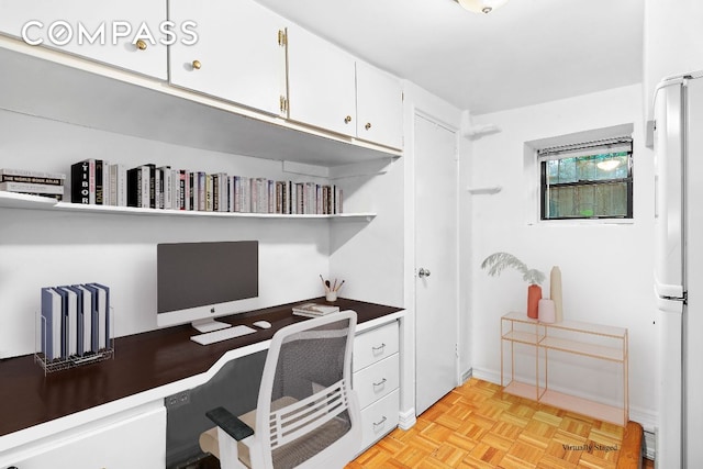 office area featuring light parquet floors