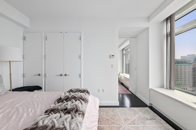 bedroom with wood-type flooring