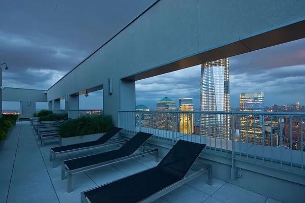 balcony featuring a view of city