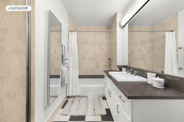 bathroom featuring vanity and shower / tub combo