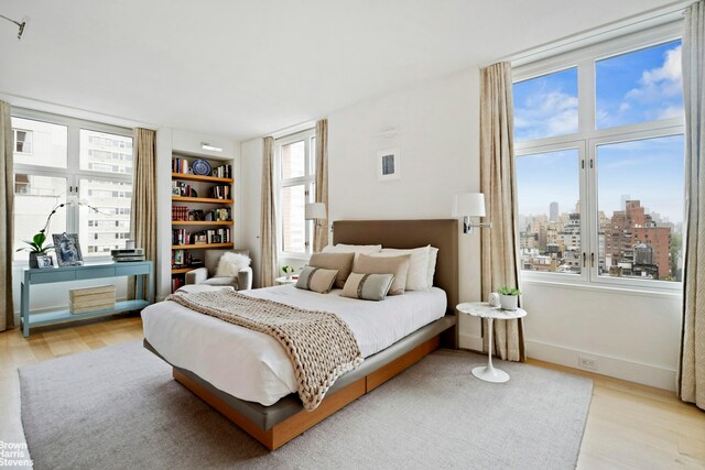 bedroom featuring light hardwood / wood-style floors