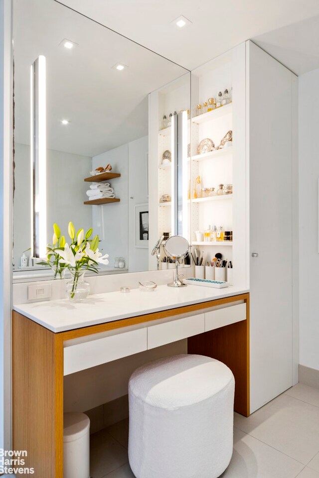 bathroom with vanity and tile patterned floors