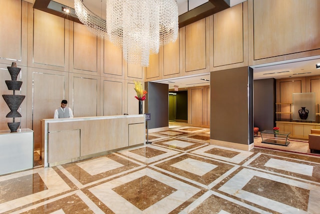 reception area featuring a chandelier