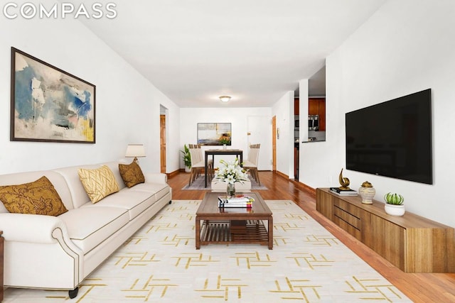 living room featuring light wood-type flooring