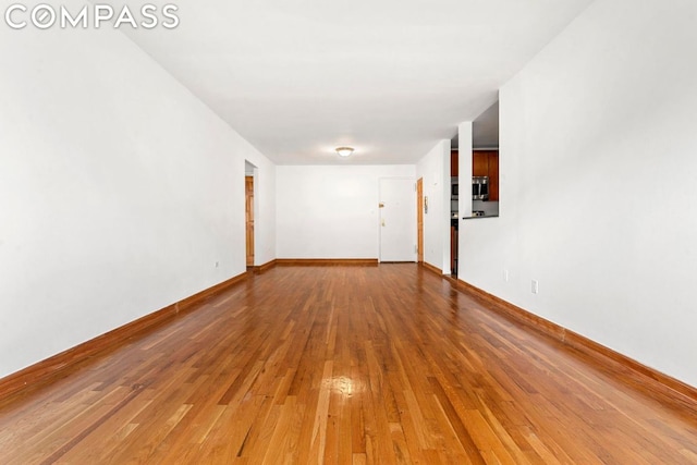 empty room featuring hardwood / wood-style floors