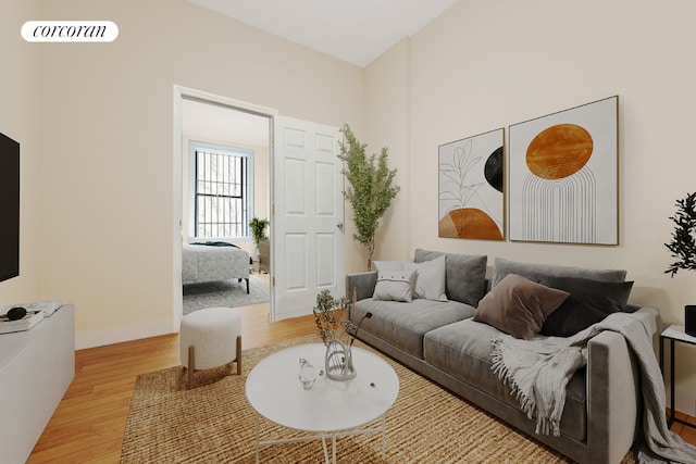 living room with light hardwood / wood-style flooring