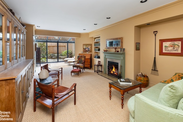 living room with light colored carpet, crown molding, and built in features