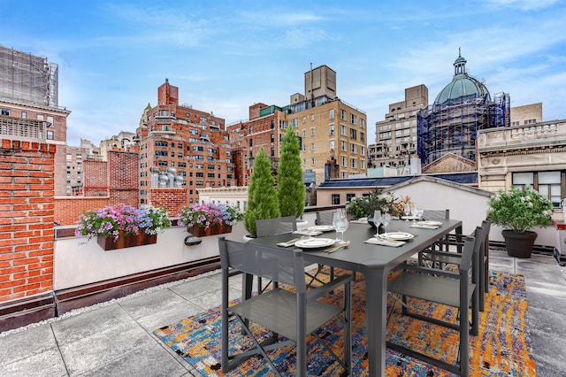 178 E 75th St, New York City, NY 10021 - view of patio featuring a city view and outdoor dining space
