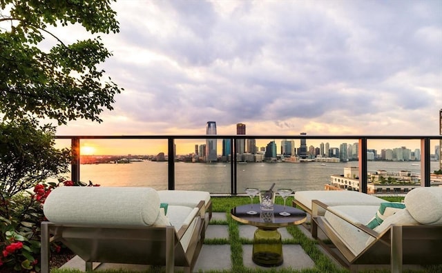 balcony at dusk with a water view