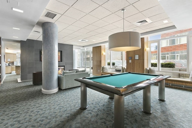 game room with decorative columns, dark colored carpet, a paneled ceiling, and pool table