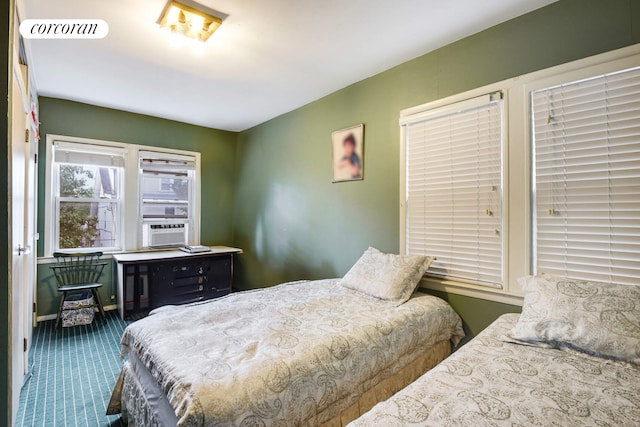 carpeted bedroom featuring visible vents and cooling unit