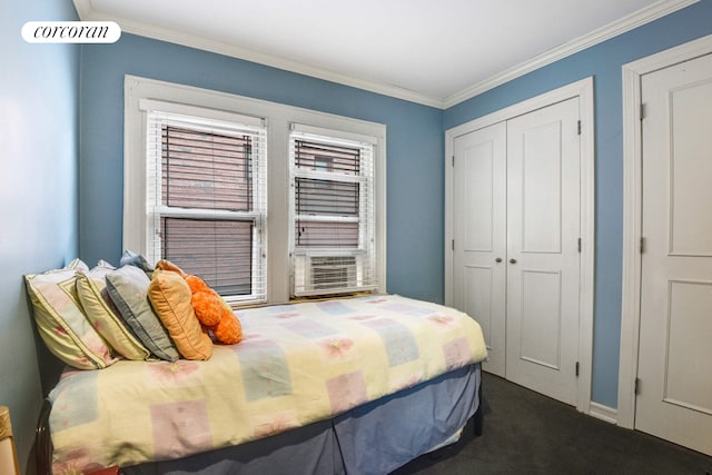 bedroom featuring crown molding, cooling unit, a closet, and dark carpet