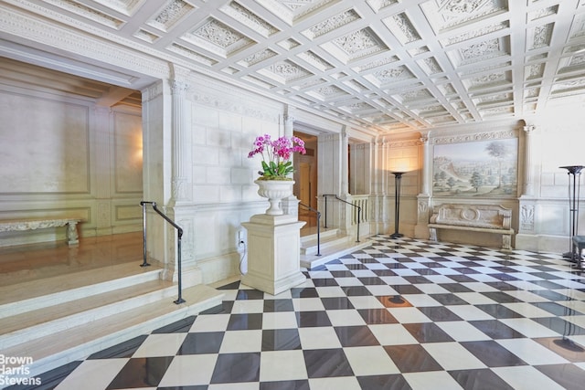 building lobby featuring a decorative wall