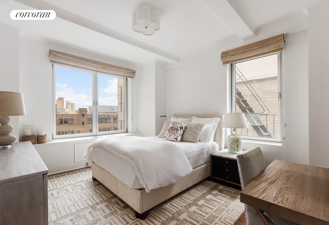 bedroom featuring beamed ceiling