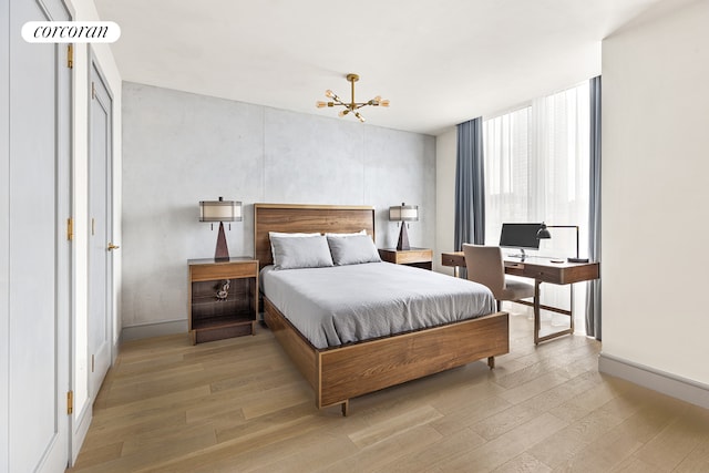 bedroom with light wood-style floors