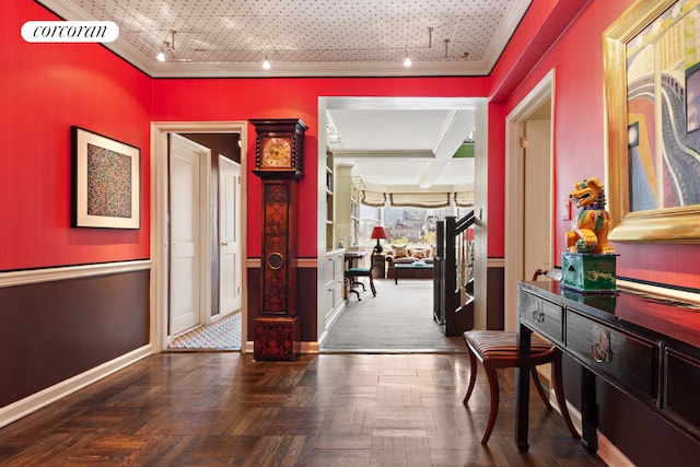 corridor featuring dark parquet flooring and ornamental molding