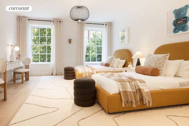 bedroom featuring hardwood / wood-style floors