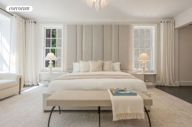 bedroom with wood-type flooring