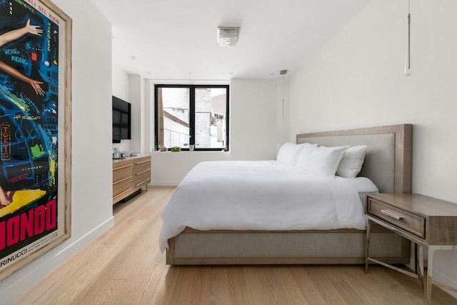 room details featuring a tiled fireplace, ornamental molding, and parquet flooring