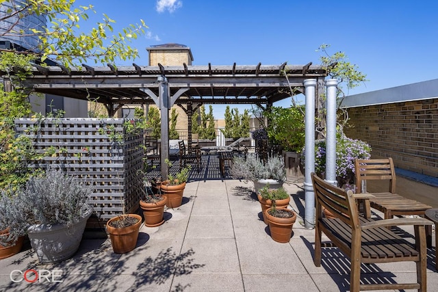 view of patio featuring a pergola